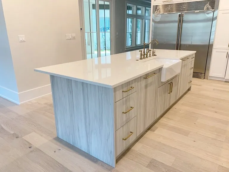 Quartz kitchen island with waterfall edge