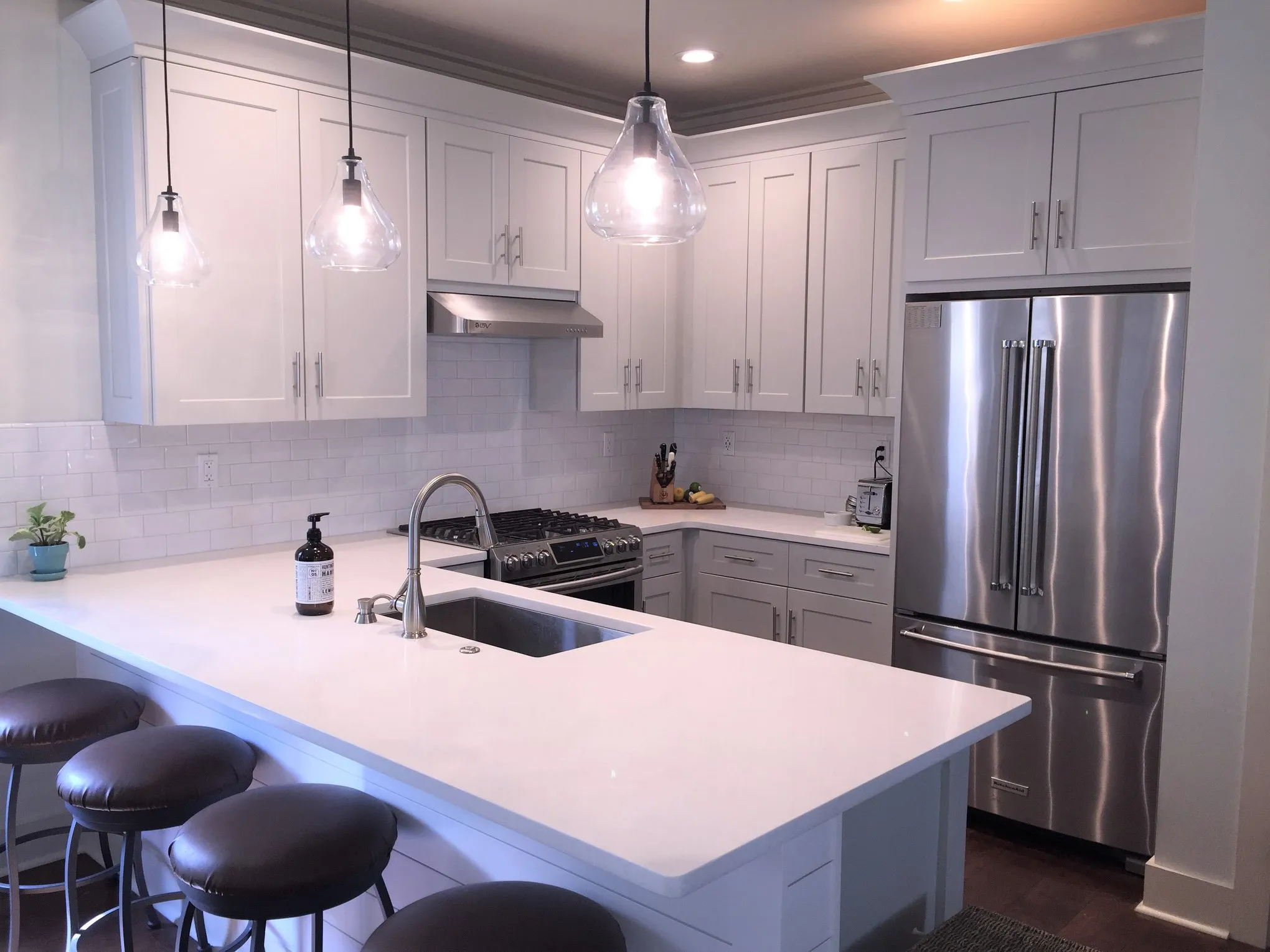 Polished quartzite kitchen counter installation