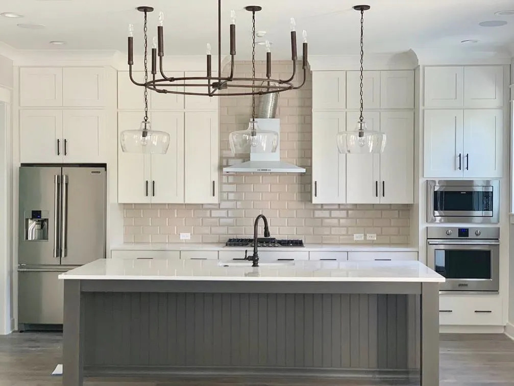 Modern white kitchen with granite countertops