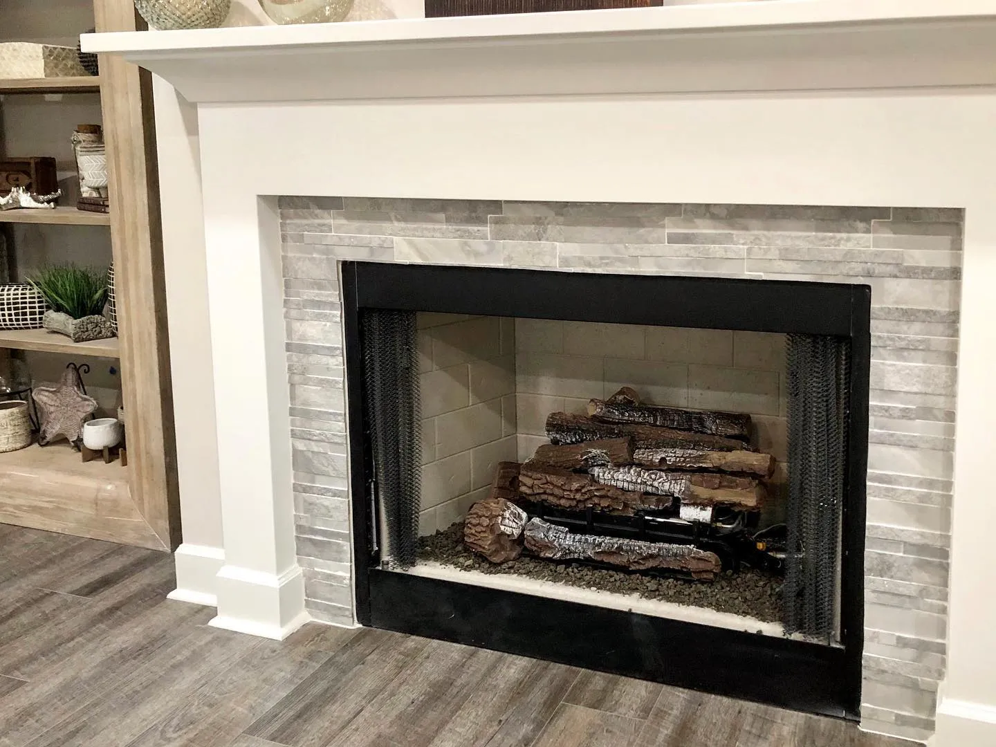 Custom granite fireplace surround in a coastal home